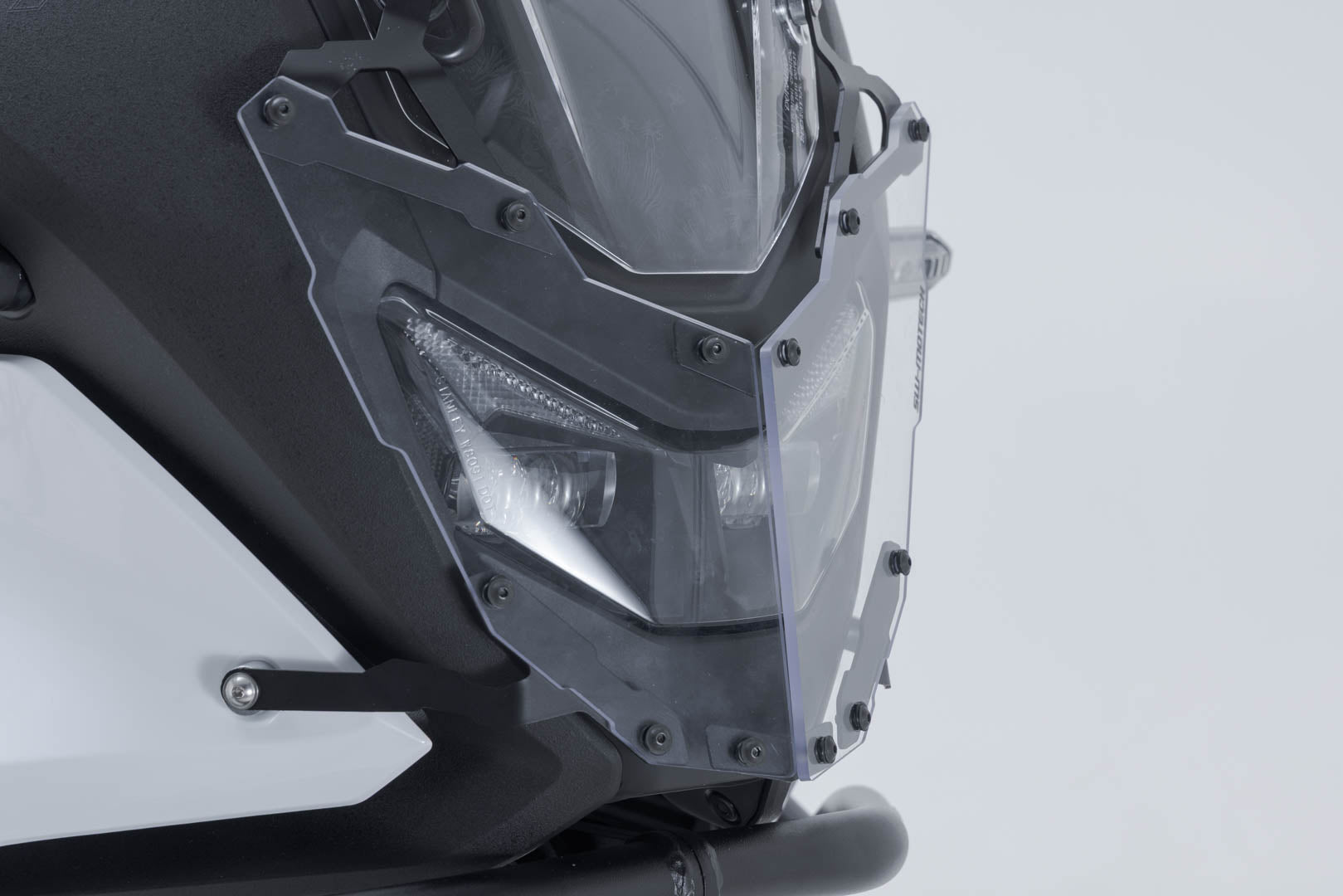 SW-MOTECH / SWモテック ヘッドライトガード用マウントブラケット（カバー付き）。Honda XL750 トランスアルプ（24-）。 | LPS.01.070.10100/B